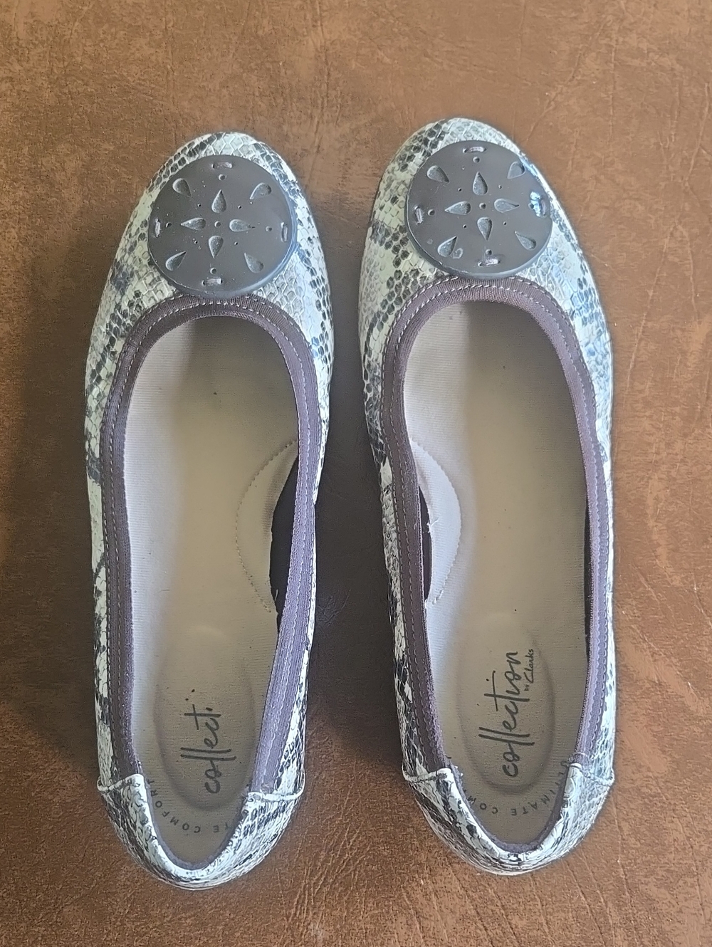 Clarks Taupe and Cream Snake-Print Ballet Flats with Silver Medallion